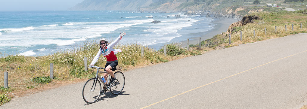 Climate Rider pedaling along the coastline