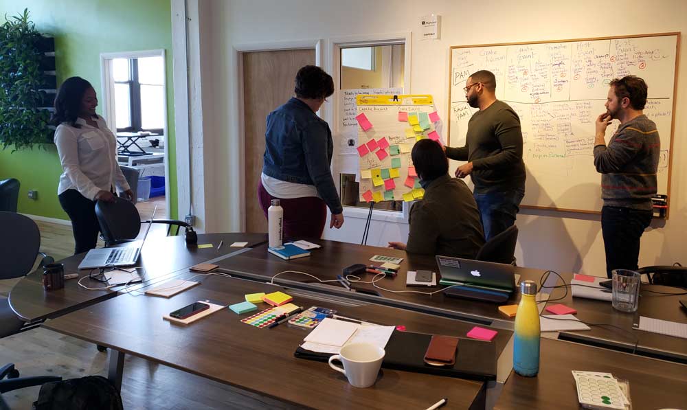 How Might We exercises during day one of a Design Sprint