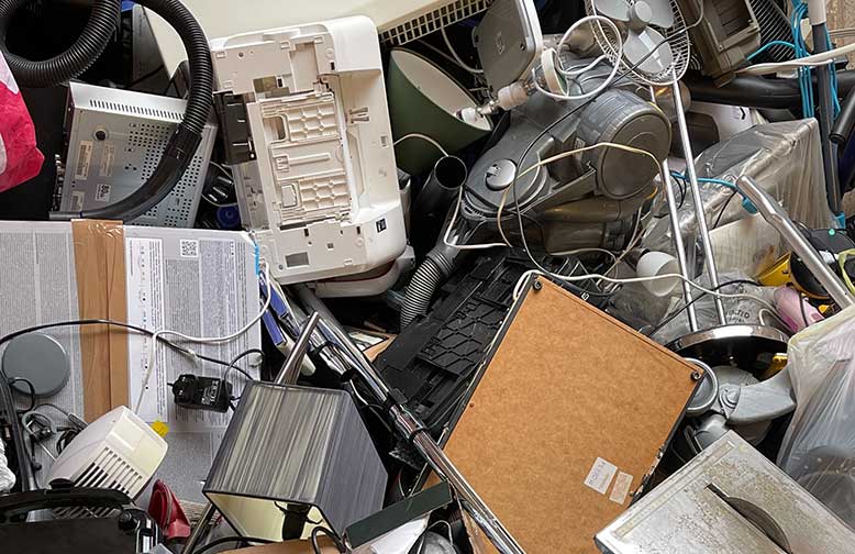image of electronic waste (e-waste) piling up