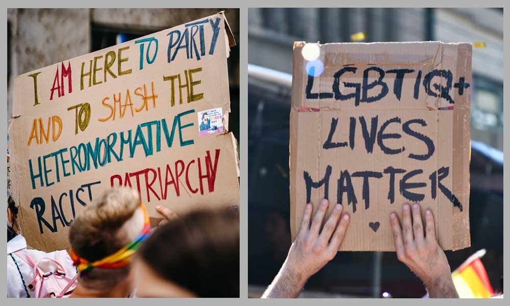Pride demonstration signs reading "I am here to party and to smash the heteronormative racist patriarchy" and "LGBTIQ+ Lives Matter"