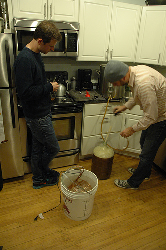 photo of two mightybytes team members brewing beer