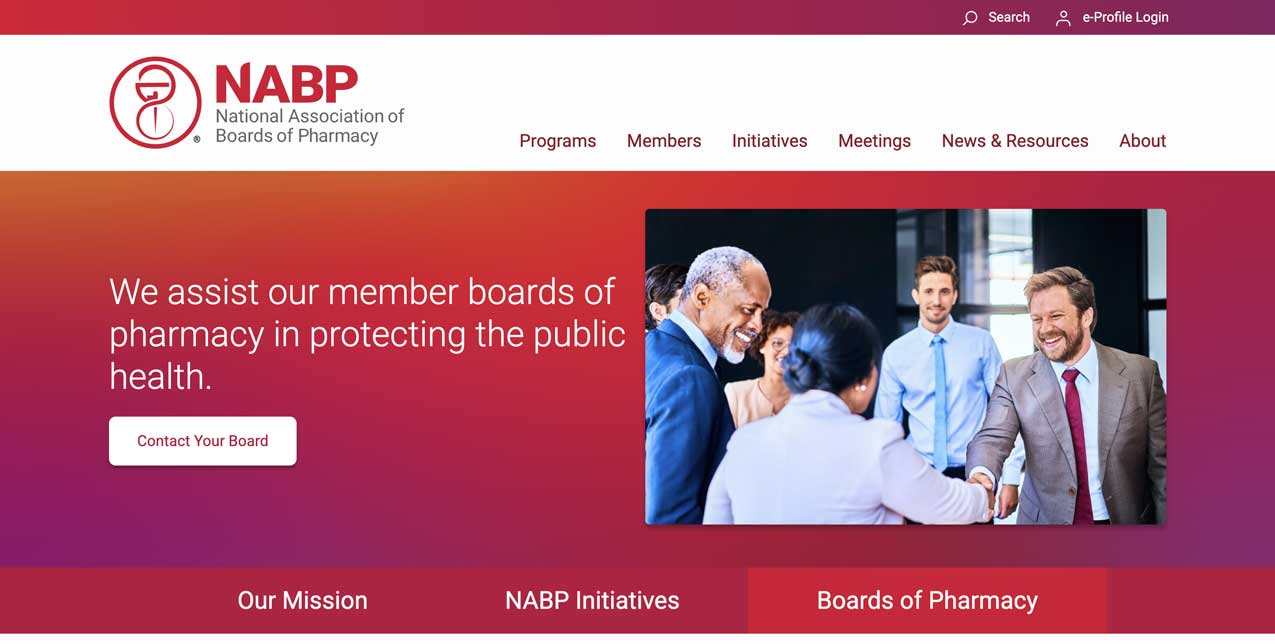 Image of NABP's homepage showing the logo, navigation, a photo of people meeting each other, and the tagline "We assist our member boards of pharmacy in protecting public health."