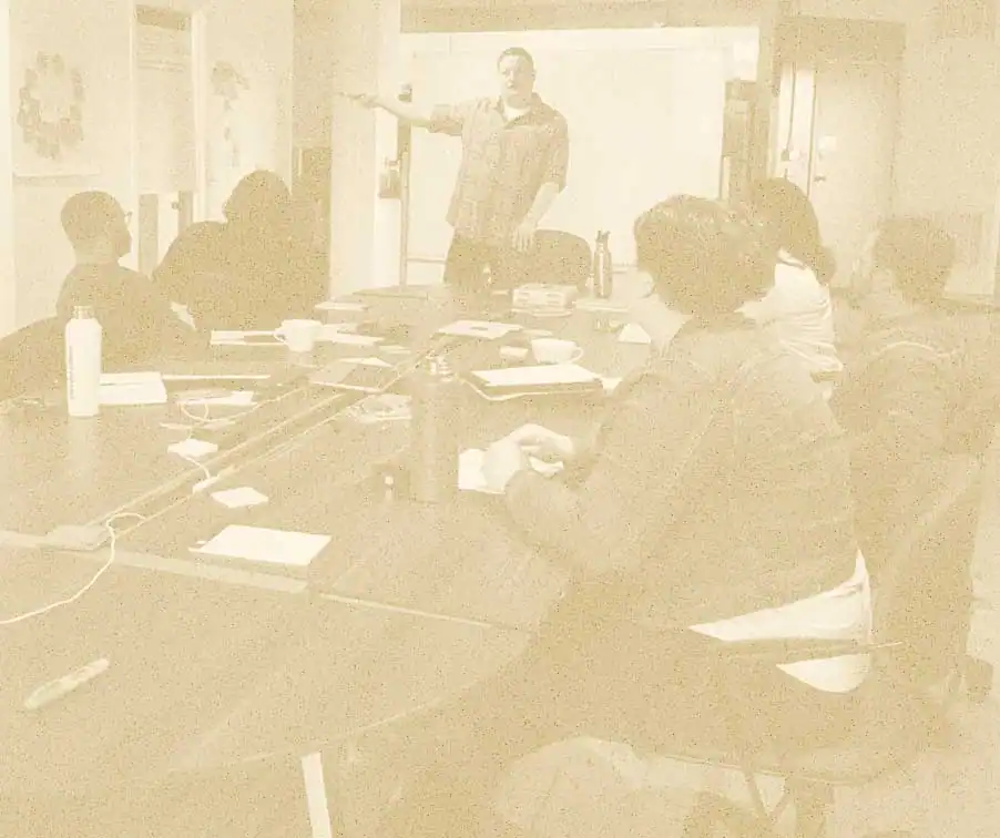 Image of a workshop with facilitator